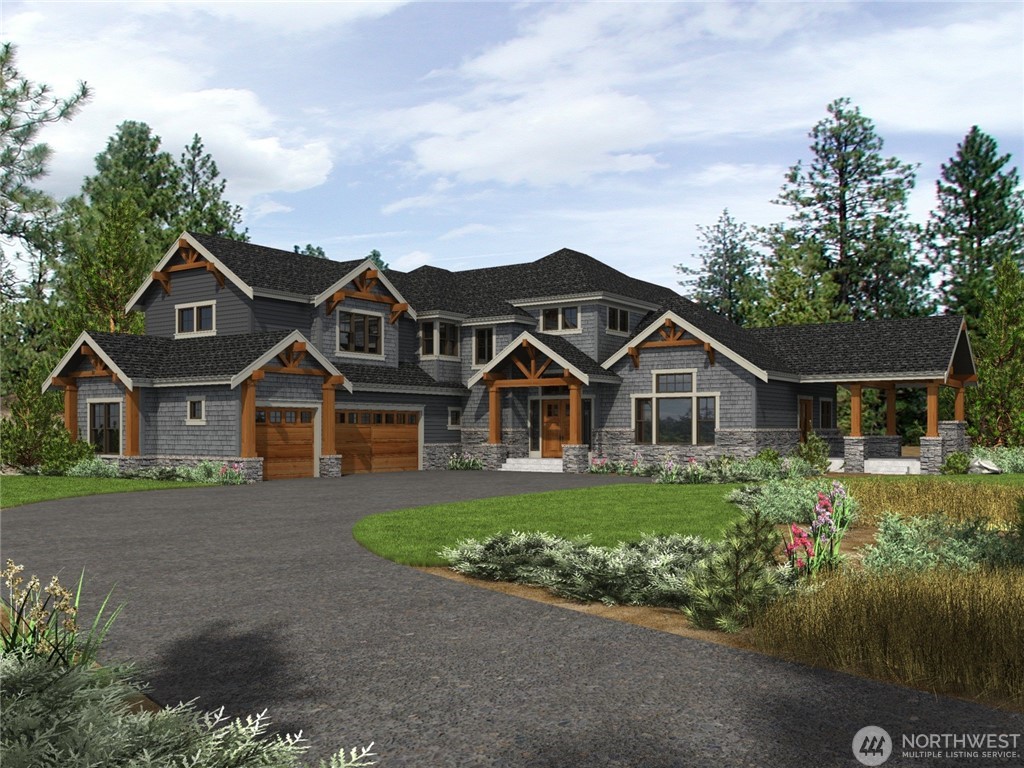 Gabled home with a timber porch and stone landscaping